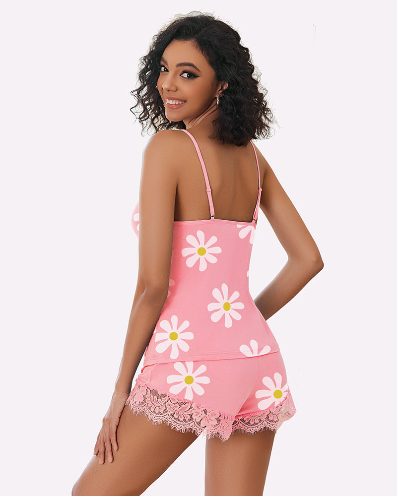 Pink floral pajama set with daisy print camisole and lace-edged short shorts
