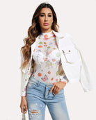 Turtleneck sheer mesh bodysuit in white with small colorful print, long sleeves.