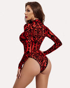 Turtleneck sheer mesh bodysuit with red and black baroque print, back view.