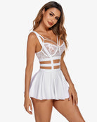 Pleated short braces skirt in white with wide cross-strap suspender detailing