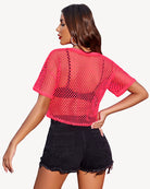 Sheer fishnet crop top with short sleeves, bright pink, round neckline