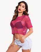 Sheer fishnet crop top with short sleeves, magenta pink, round neckline