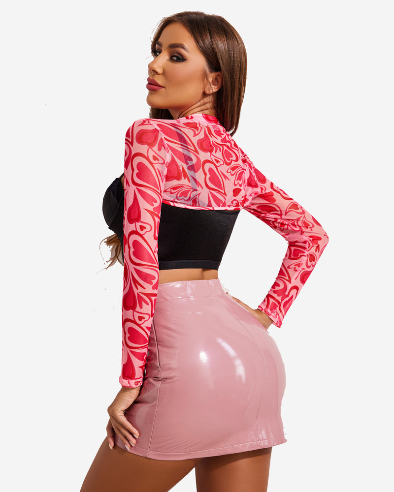 Red and white swirl print mock neck long sleeve crop top, back view.
