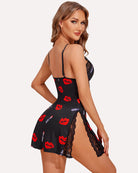 Lips print chemise with lace trim and spaghetti straps, black with red pattern, side view