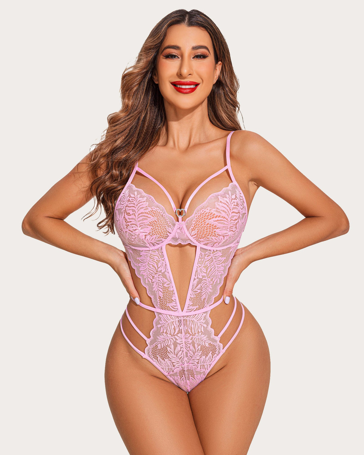 Pink lace deep V lingerie bodysuit with strappy design and scalloped trim.