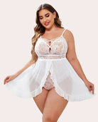 White lace babydoll with crisscross neckline and flowing ruffled overlay