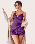 Purple satin pajama shorts set with lace bust, adjustable straps and elastic waist