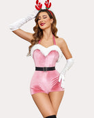 Pink velvet romper with white faux fur heart trim, black belt buckle, white gloves