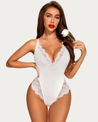 White lace teddy one-piece with deep V neckline and scalloped lace trim