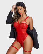 Red lace bodysuit with garter belt, lace-up straps, and thigh garters