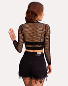 Black long-sleeve fishnet crop top, back view, with solid hem band and fitted waist