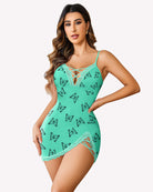 Teal lace slip dress with butterfly print, crisscross neckline and scalloped hem
