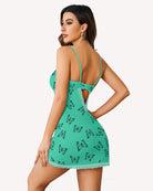 Teal lace slip dress with butterfly print and open back, finished with scalloped lace hem