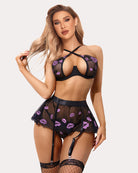 Black lace lingerie set with purple lip print halter bra and garter mini skirt
