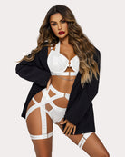 White lingerie garter set with chain under garter straps and panties, with dark robe
