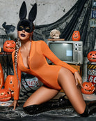 Orange sheer bodysuit with long sleeves and front zipper, smooth mesh