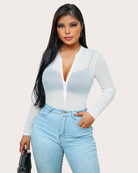White sheer bodysuit with long sleeves and zip front, deep V neckline, molded cups.