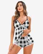Black and white plaid lace-trim pajama set with spaghetti straps and matching shorts