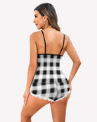 Black and white plaid lace-trim pajama set from back view with adjustable straps