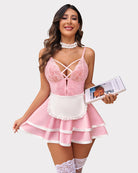 Pink lace maid babydoll dress with crisscross neckline, white apron, and tiered skirt