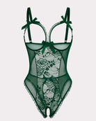Dark green lace mini bodysuit with sheer mesh panels, underwire cups, and ribbon bows