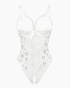 White lace mini bodysuit with small floral print and bow shoulder straps