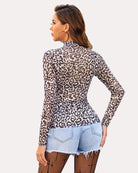Leopard print long sleeve mock neck mesh crop top, seen from the back with fitted waist.