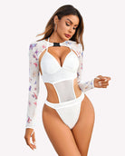 White butterfly rave bodysuit set with mesh long-sleeve crop top and halter bra