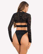 Black leopard mesh rave set with back band, halter crop top, and high-cut thong