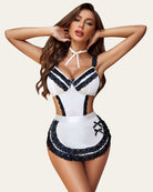 French maid lace teddy in white with black lace trim, ribbon neck tie, ruffled mini skirt