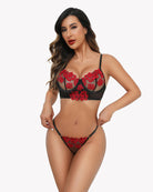 Black embroidered lace bra and panty set with red floral applique and lace panties