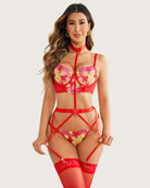 Red embroidered lace bra and panty set with floral mesh and strappy garters