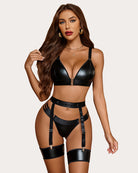 Black leather bra and panty set with garter straps and thigh-highs