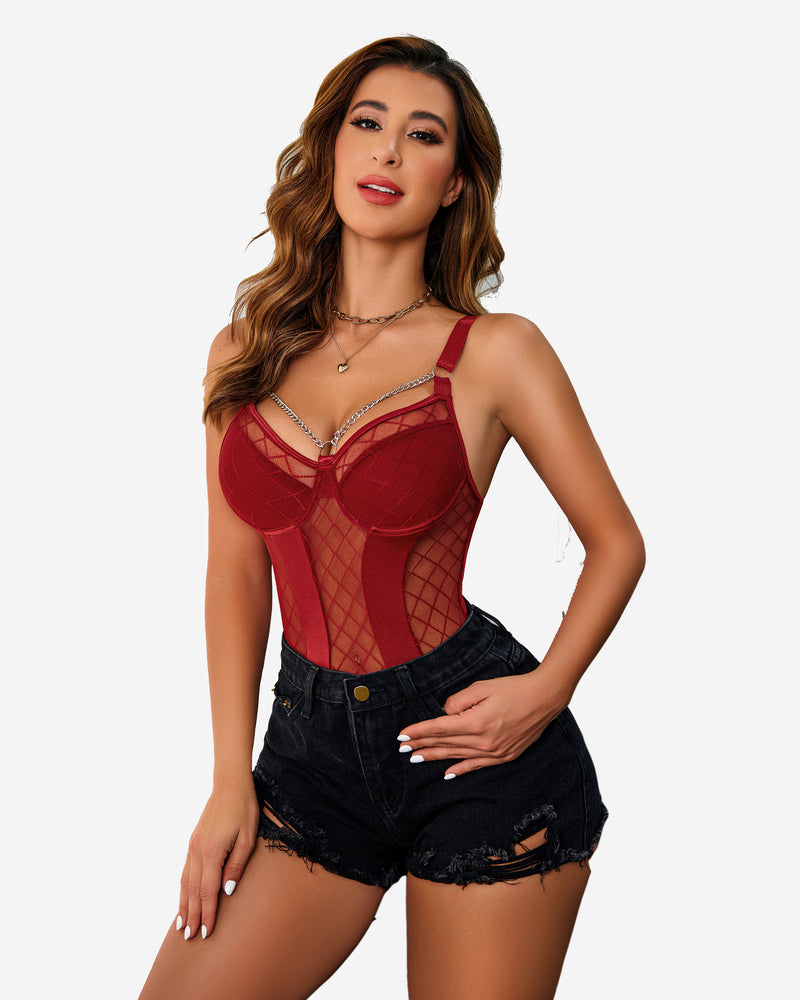 Red mesh bodysuit with push-up cups, chain garters, and waist ring over denim shorts