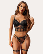 Black lace boned bra and panty set with garter straps, front view.