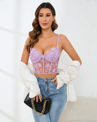 Light purple lace boned bra and panty set with garter straps, front view.