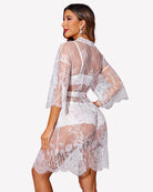 White lace 3-piece lingerie set with robe, bra, and panties, back view.