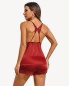 Dark red satin pajama set with open-back lace straps and matching lace-trim shorts
