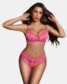 Pink lace bra and panty set with front bow, underwire lace cups, scalloped trim