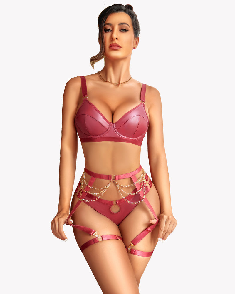 Burgundy leather bra and panty set with garter belt and chain accents