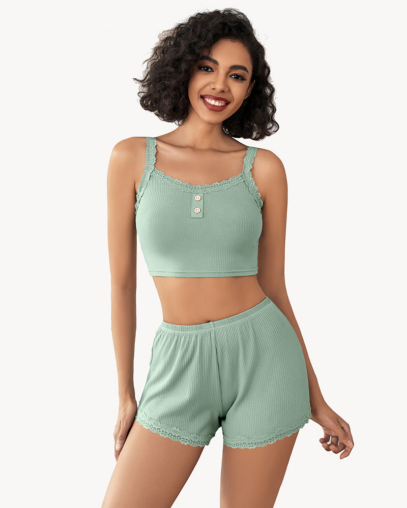 Light green ribbed pajama set with lace-trim camisole and matching shorts
