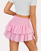 High-waist ruffle mini skirt, pink, tiered ruffle hem and smocked elastic waist