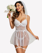 White lace underwire lingerie set with chain straps, sheer tulle skirt, garter belts
