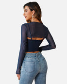 Dark mesh long-sleeve crop top set shown from back with open center
