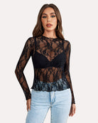 Black sheer lace long-sleeve peplum blouse with floral lace overlay and round neckline