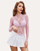 Pink sheer lace floral long-sleeve blouse with peplum hem and high neckline
