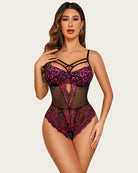Burgundy lace one-piece bodysuit with crisscross straps and sheer black panels