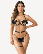 Black bow bra and panty set with heart belt, bows, and chain garters