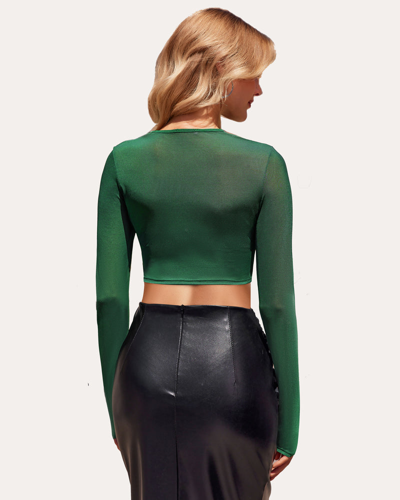 Green long sleeve mesh crop top, sheer back panel, cropped length.