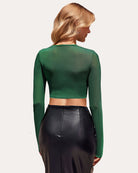 Green long sleeve mesh crop top, sheer back panel, cropped length.